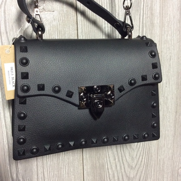 Handbags - NWT RECYCLED TIRE Black Stud Purse Unique